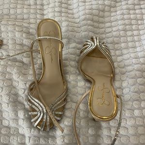 Gold and rhinestone heels